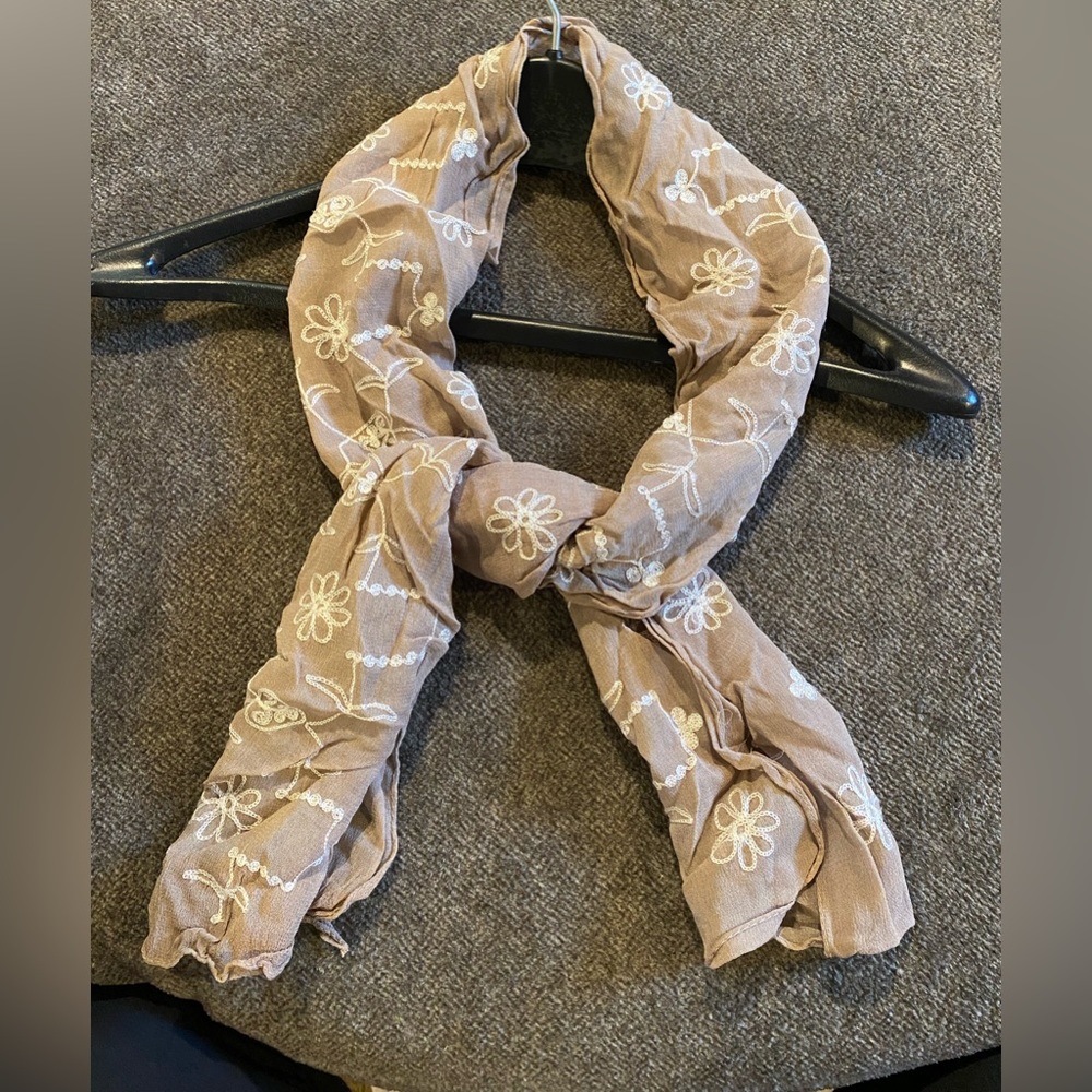 Semi-sheer tan woman scarf with floral stitching, approx 52”